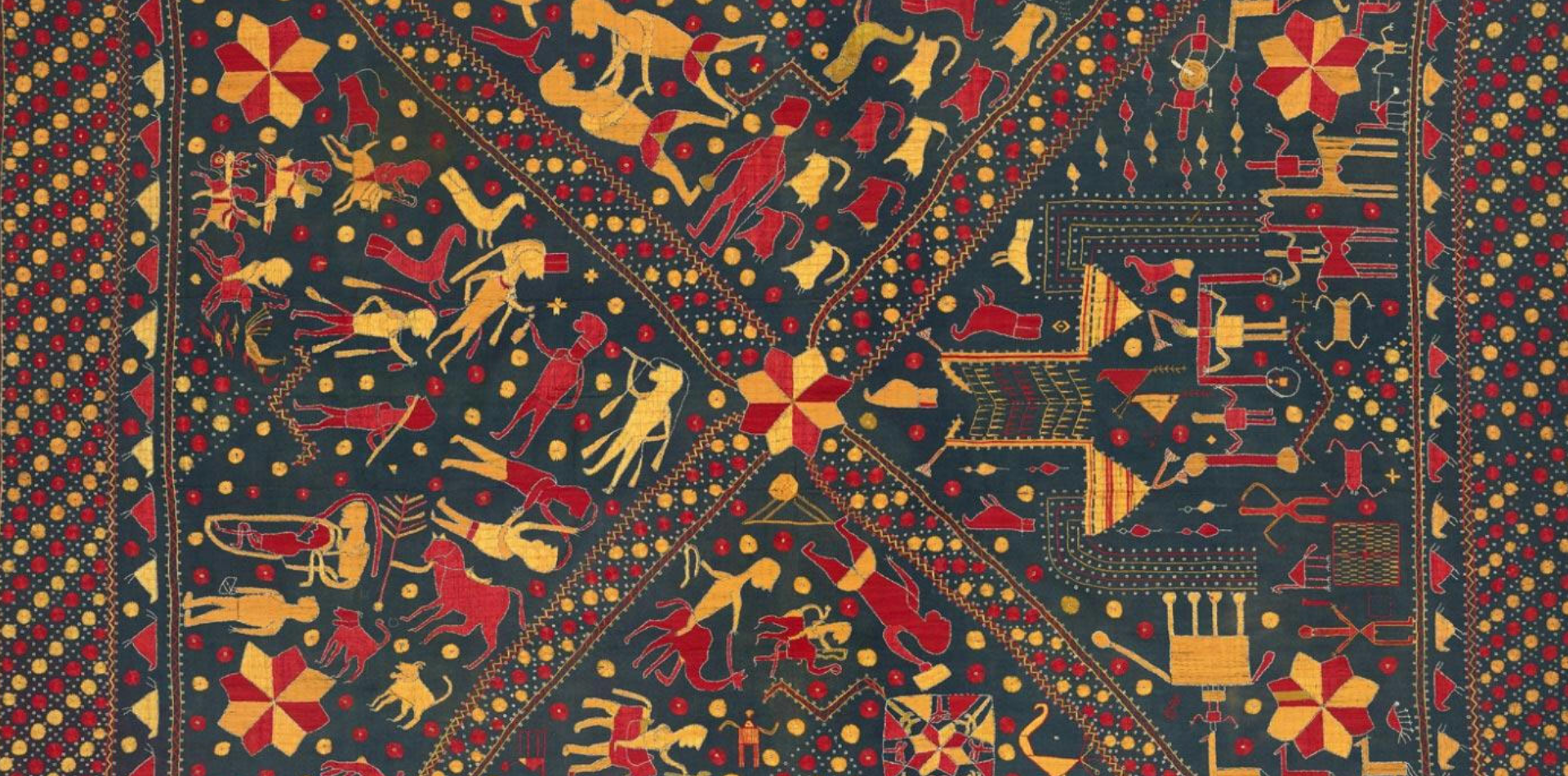 An embroidered shawl from Punjab depicting a village scene