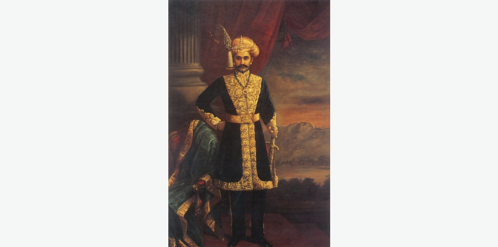 A portrait of an ornately dressed man in a black coat and an elaborate headdress stands in front of a painted landscape background. There is a draped green cloth on a chair to his right.
