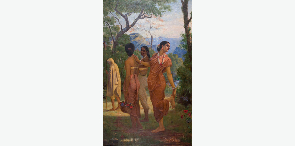 A group of three women in orange garments and a man clad in a shawl walk through a forest. The woman on the right holds her foot and glimpses back at something out of frame.