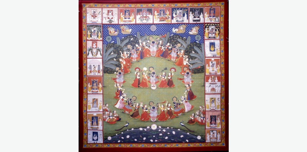 Set against the backdrop of a forest, a pond and chariots in the sky, the central composition features a group of women dancing in a circle around a central blue male figure. It is bordered by small square grids depicting worship scenes.