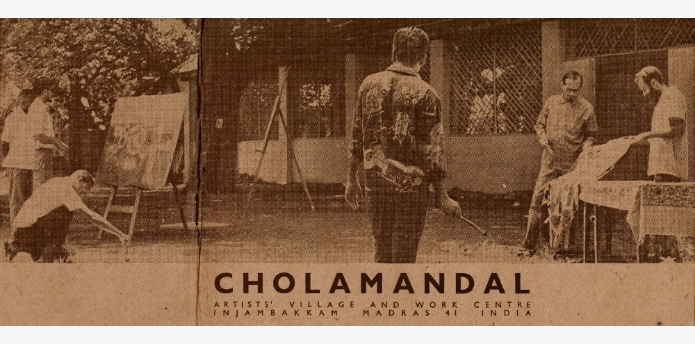 A photographic print of a group of artists painting outside a building titled ‘Cholamandal’.