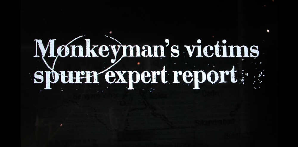 A black background with the English text, ‘Monkeyman’s victims spurn expert report’.